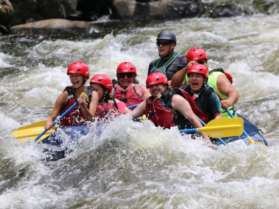 Brianna Aviles and others white water rafting.